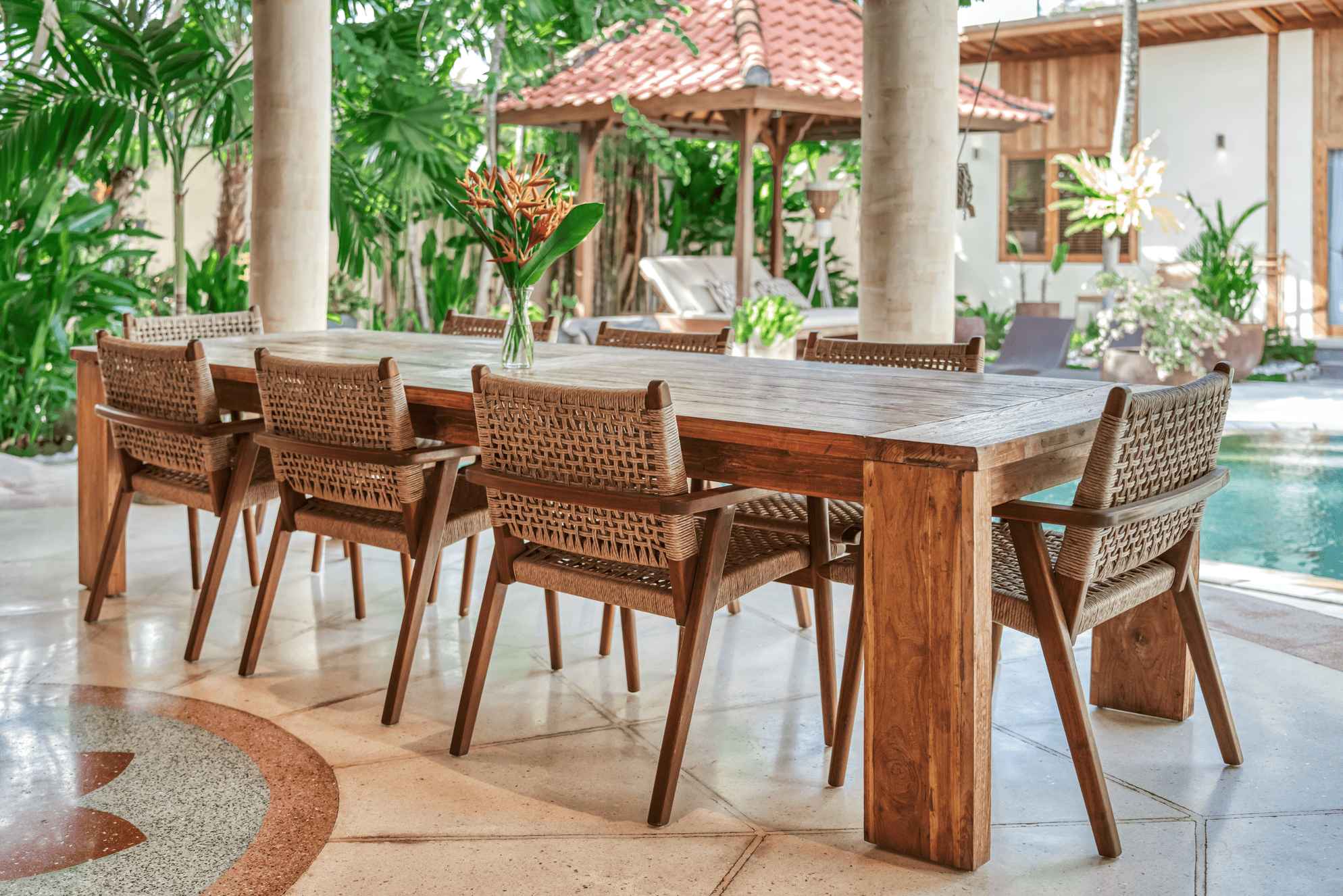 Outdoor dining chairs and tables at Villa Mus in Bali