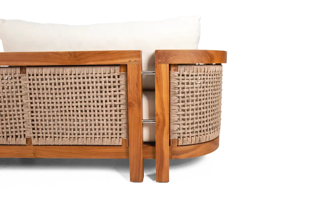 Close-up of the woven loom and teak backrest of AUREA sofa with white fabric-upholstered seating