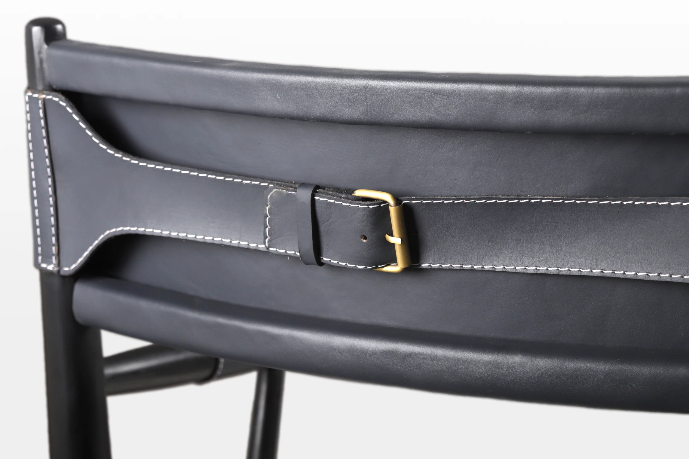 NAPOLI dining chair with leather backrest details from the leather collection