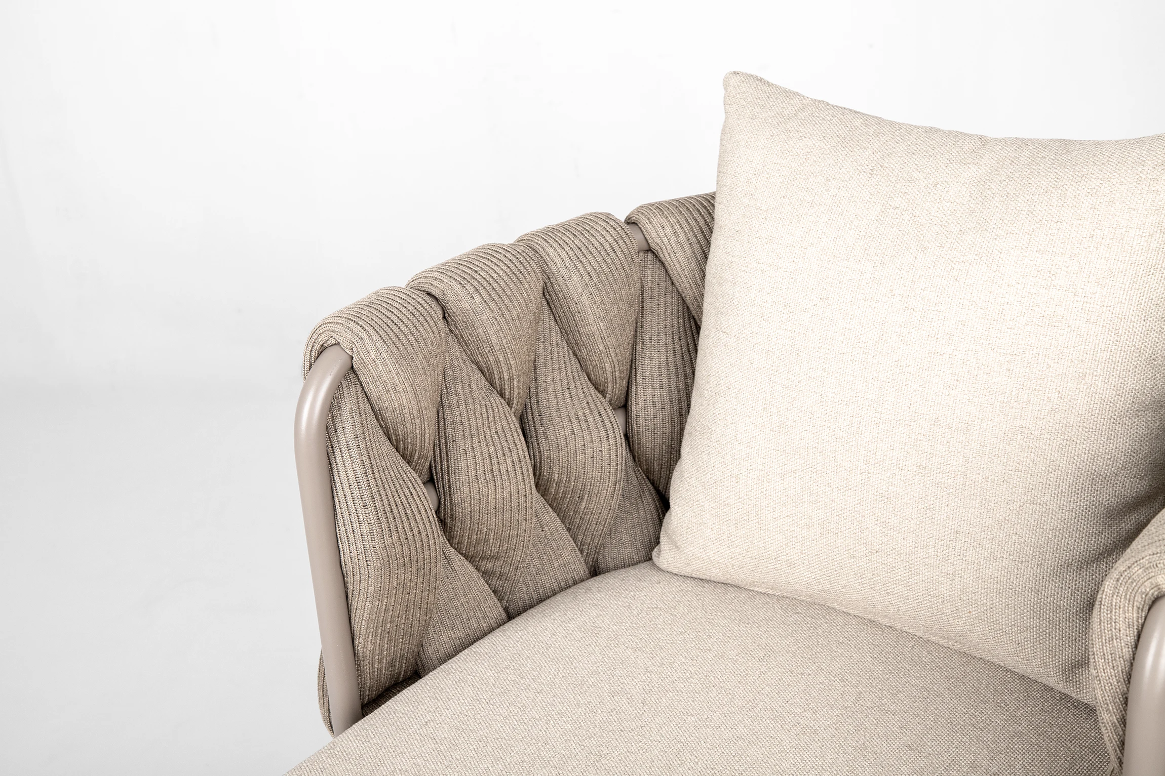 SECRETS outdoor dining chair made of metal with a fabric upholstered seat in close up front view