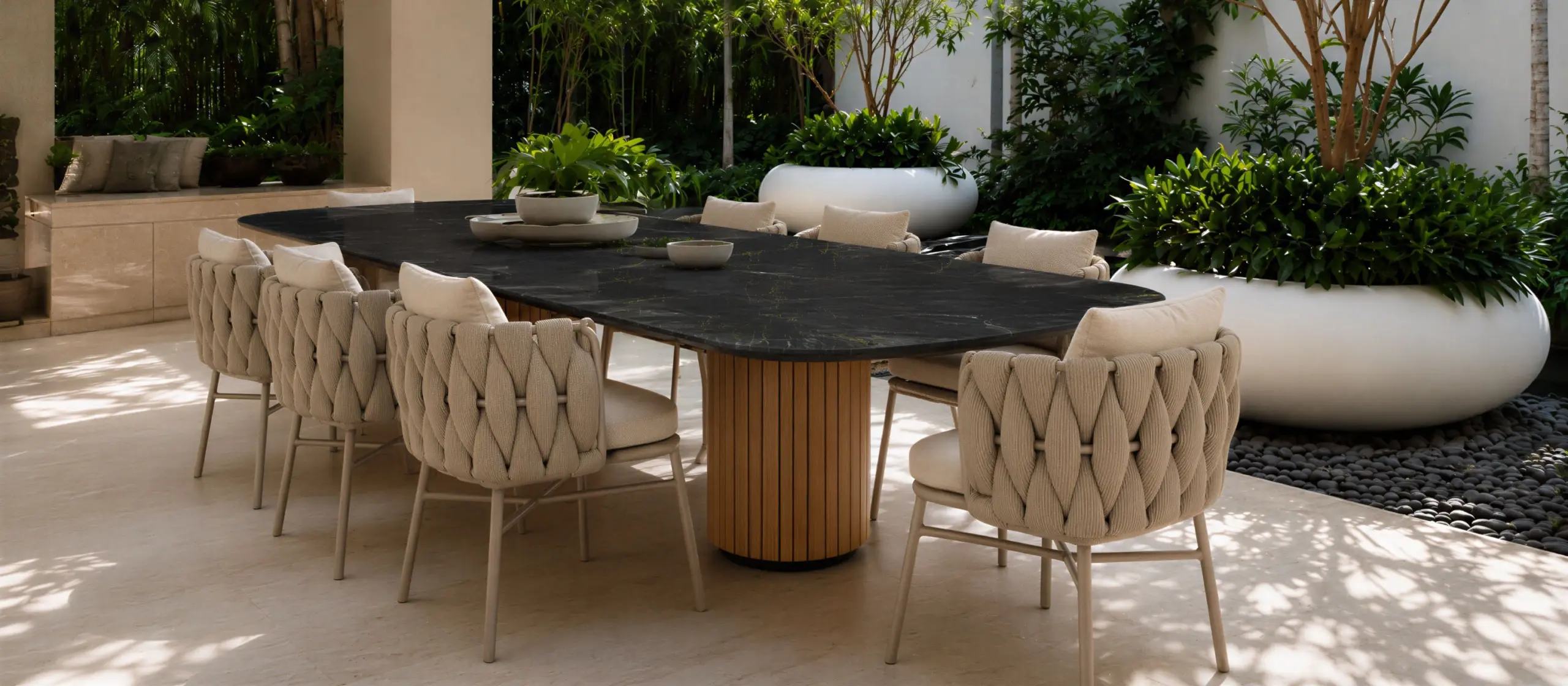 Outdoor dining area with Secrets chairs paired with Coral table from the upholstery collection