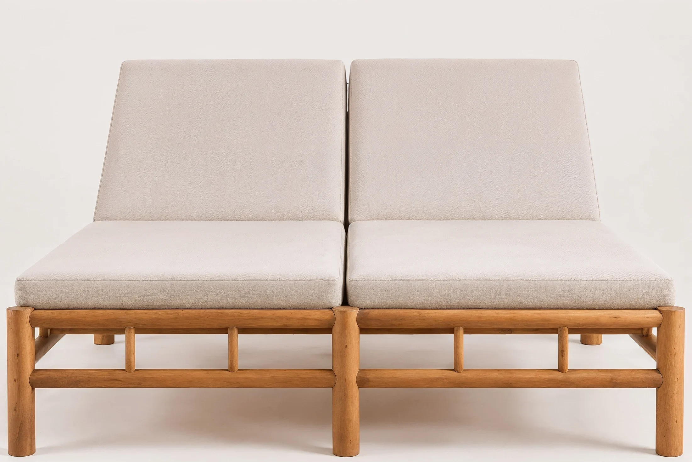 LA Sun Lounger made of teak & fabric cushion in white studio room