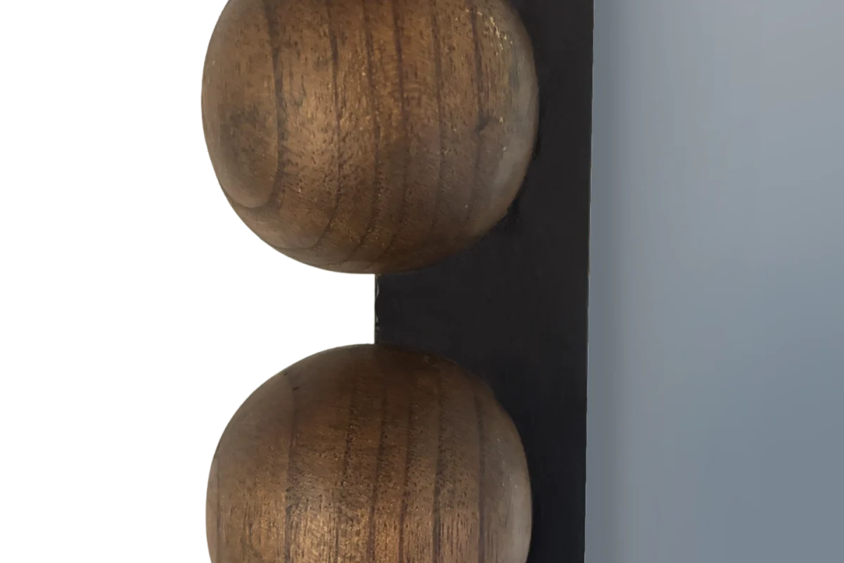 Close-up of the rounded wood detailing of SIENA arched mirror frame