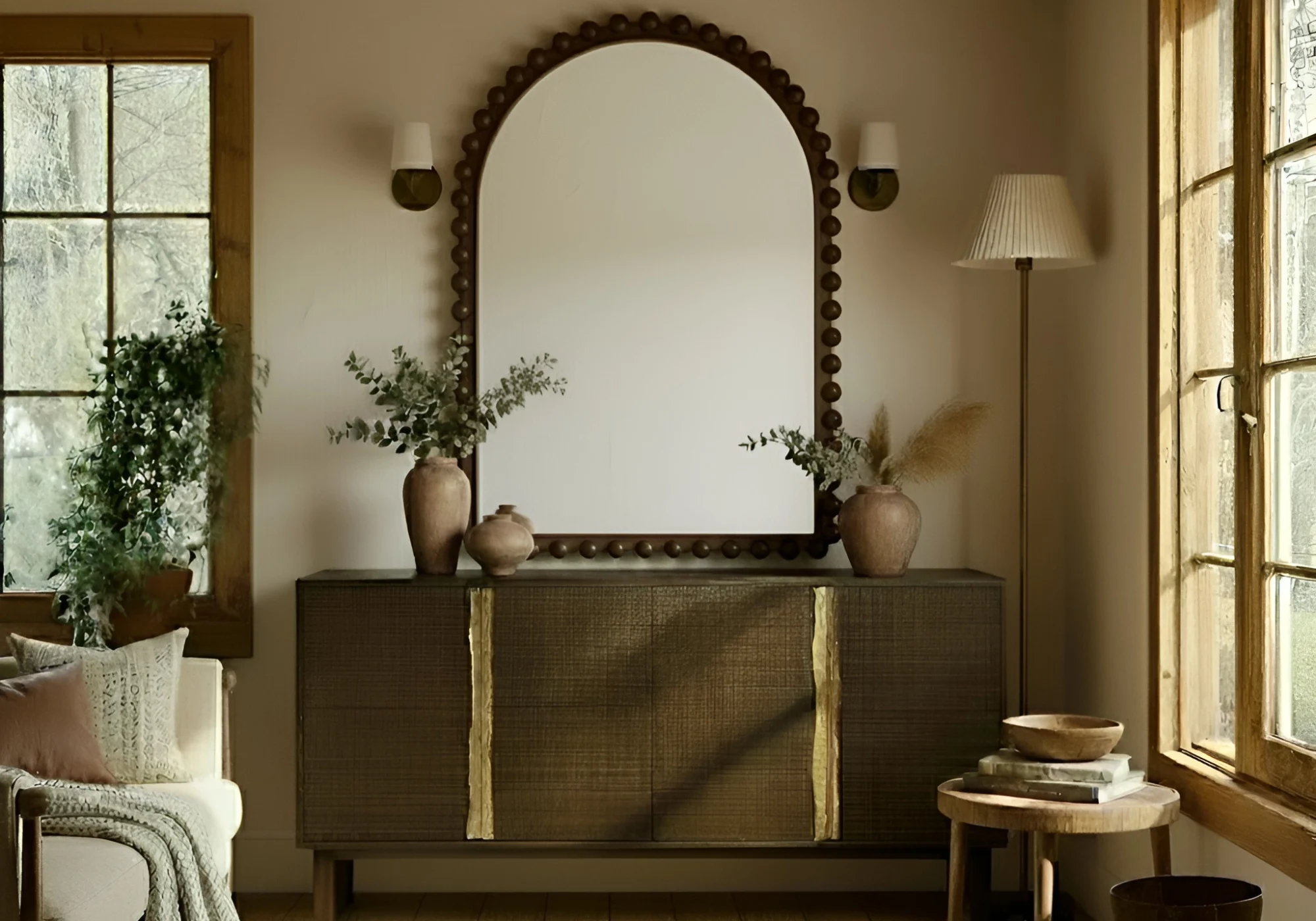 SIENA decorative arched mirror made of java oak with rounded wood detailing in a luxury villa living room