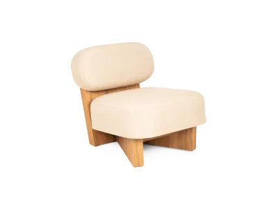 RICHI lounge chair made of teak with fabric upholstery seating in three-quarter view